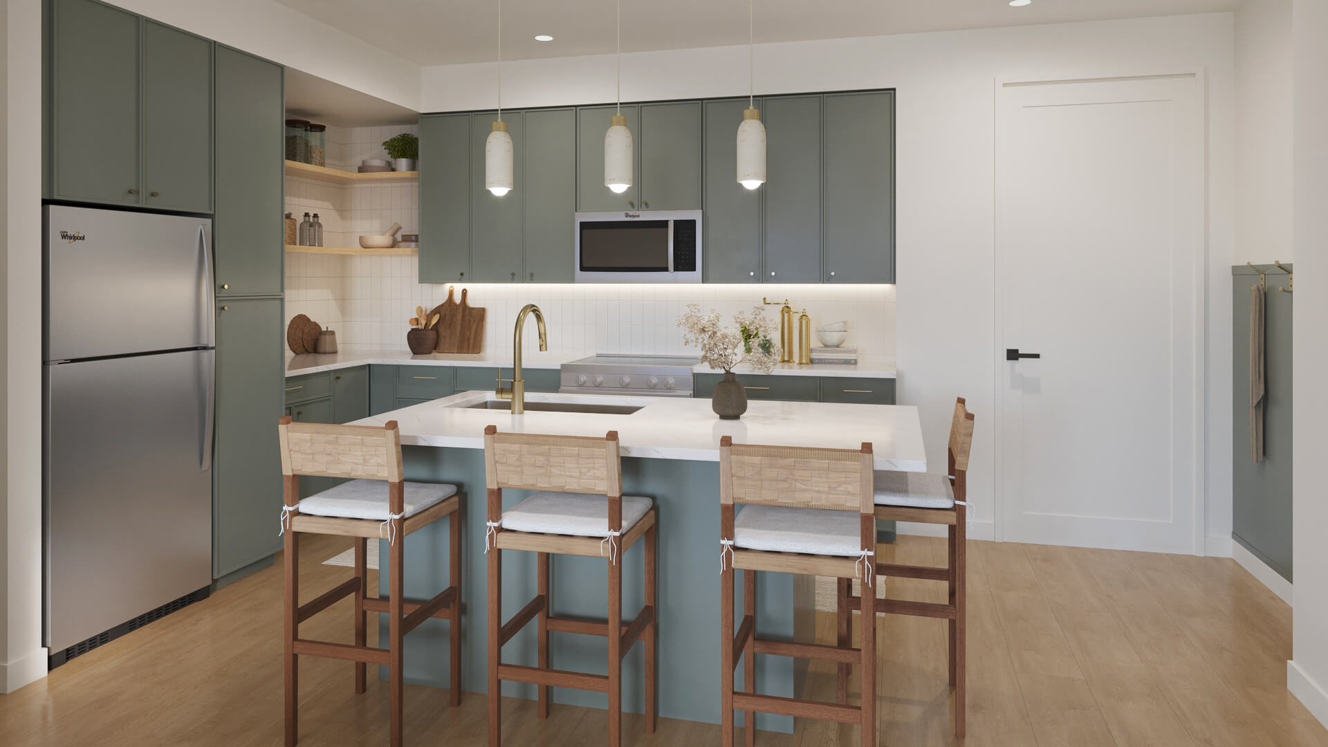 Contemporary apartment kitchen with stainless steel appliances, a large central island with a gold faucet, and four woven wood barstools